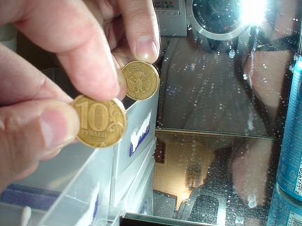 Счастливая монета 10 руб 2012 г. брак (перевертыш)