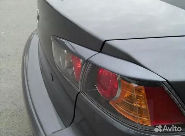 Накладки (реснички) на задние фонари Lancer 10