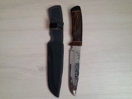 Нож