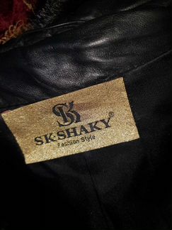 Кожаная пальто с норкой