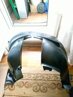 Передний левый подкрыльник